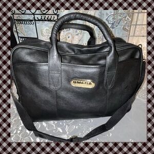 Omega Leather Duffel Bag